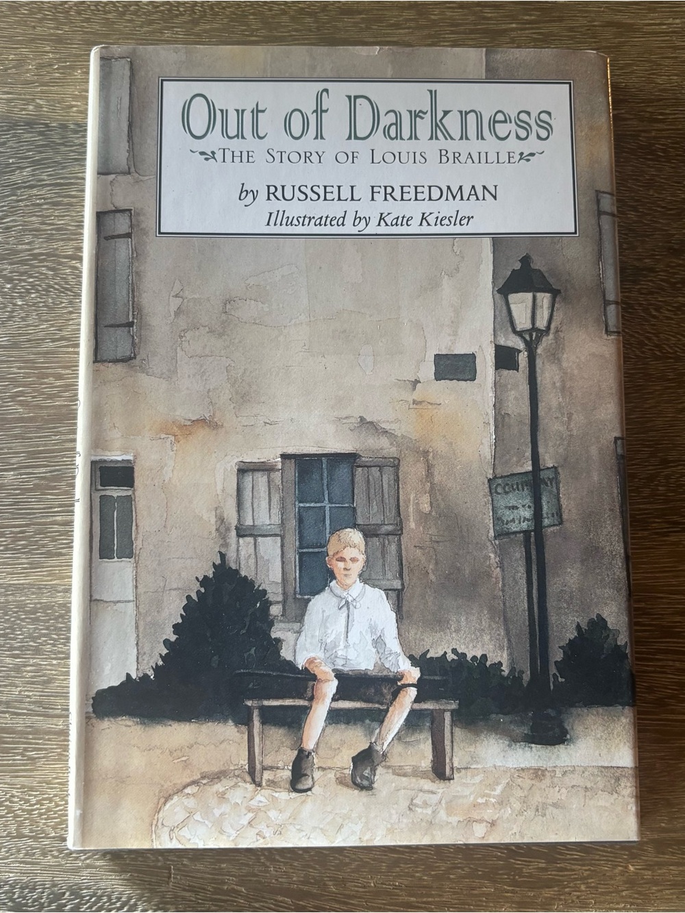 Out of Darkness: The Story of Louis Braille by Russell Freedman Hardcover Book